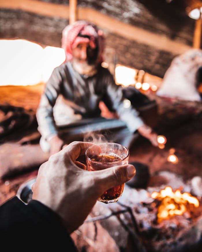 Experience a warm welcome with traditional tea in a Bedouin tent in Aqaba, Jordan.